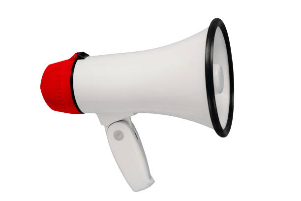 istock White and red megaphone isolated from background. Alarm and announcement 1464508295