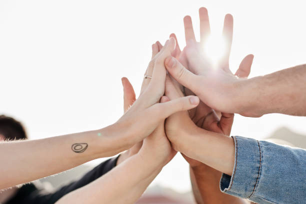istock Goals, success or hands high five with support or hope in celebration together as a group with a mission. Motivation, teamwork or people in winning partnership with hope, trust or faith outdoors 1464509533