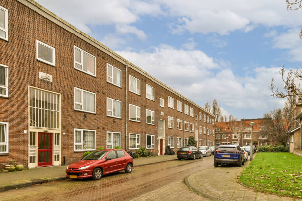 istock a brick building with cars parked in front of it 1464510635