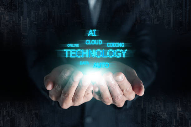 istock smart businessman in suit hold technology AI cloud data coding and business technology wording in hand with skyline building downtown at background 1464511460