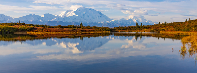 a scenic landscape reflection in Denali National Park Alaska in autumn