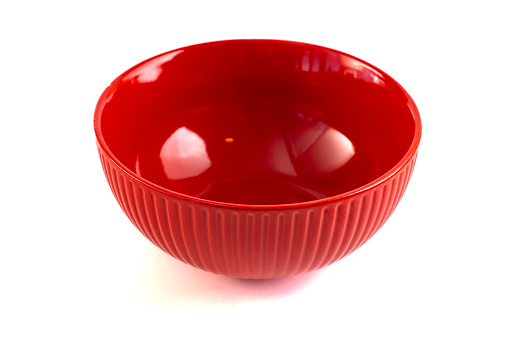 An Empty and Clean Red Bowl Isolated on a White Background
