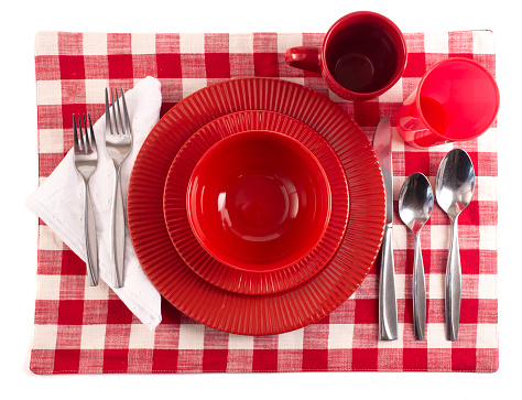 Table with a Gingham Place Mat Set for a Meal