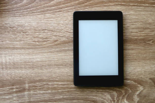 E-Reader on Wooden Background stock photo