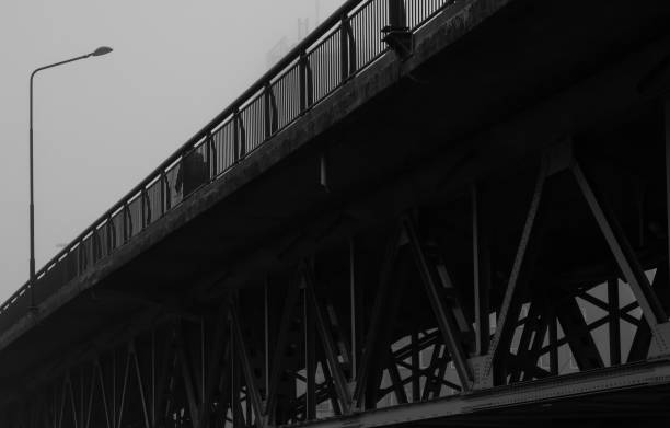 concrete bridge or overhang road on a grey and misty day. - 80ies imagens e fotografias de stock