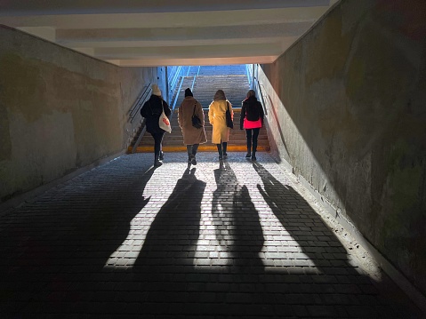 Kyiv Ukraine-February 2023: Women go through the underpass.