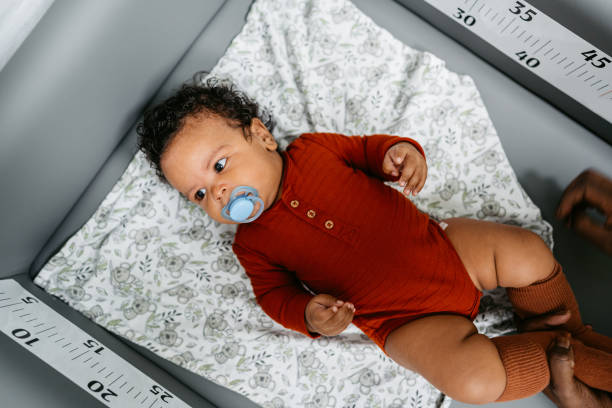 istock Newborn Baby Boy Having A Pediatric Exam 1464535092