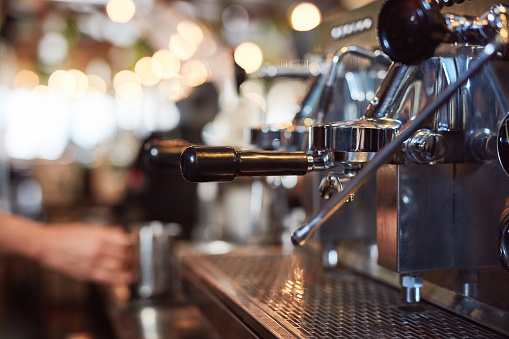 Coffee machine, shop and small business cafe or restaurant for service of espresso, latte or tea liquid. Manufacturing, process and electrical industrial object for a hot drink from a barista