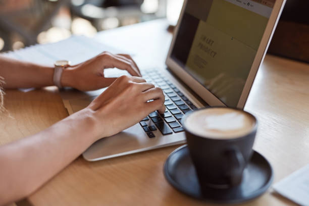 istock Coffee cup, hands or typing on laptop in cafe or restaurant for university, college or school studying. Zoom, drink or cappuccino beverage for student woman on technology for research in remote work 1464537764