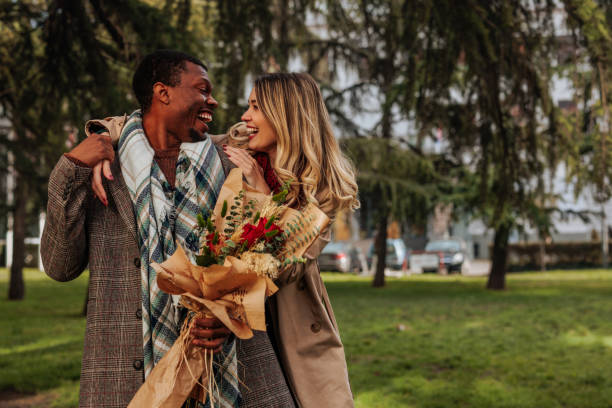 istock Happy couple meeting for date. 1464540942