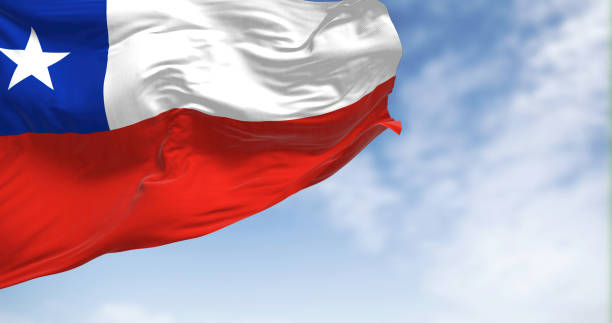 istock Chile national flag fluttering in the wind on a sunny day 1464541358
