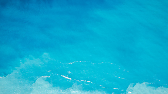 The beautiful blue Ionian Sea on the island of Kefalonia in Greece - Egremni Beach
