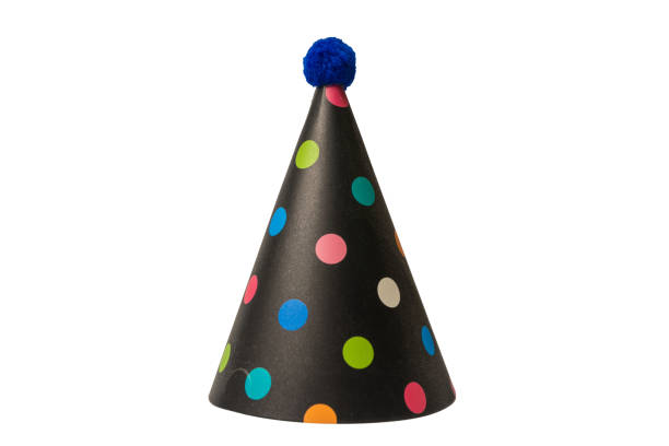 istock Bright and colorful birthday cap isolated on a white background. 1464548318