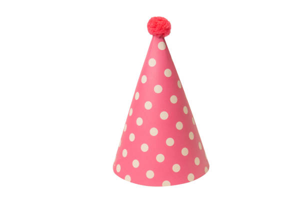 istock Bright and colorful birthday cap isolated on a white background. 1464548375