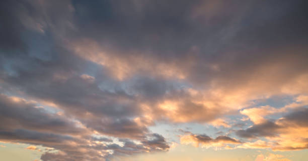 istock Colorful sunset with cloudy skies 1464548378