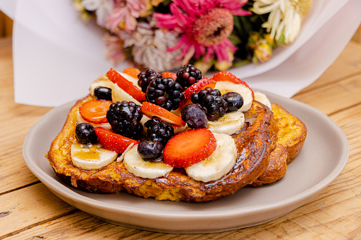 Delicious breakfast of french toast with fresh fruit