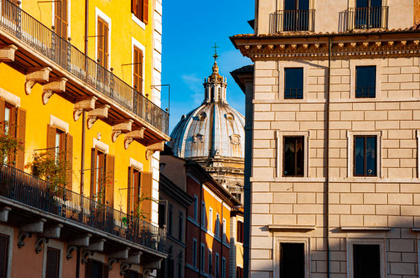 istock An architectural dome on a sunny evening in Rome 1464556812