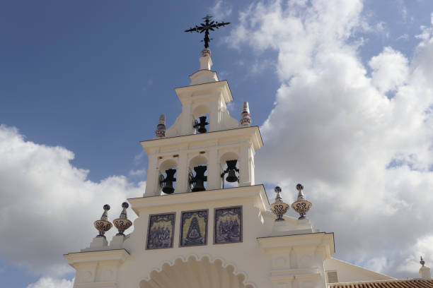bell tower of the hermitage of el rocio, in almonte (huelva, spain) - rocio monasterio imagens e fotografias de stock