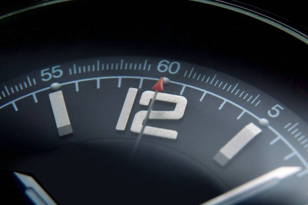 istock part of a clock face with a second hand close-up. 1464559887