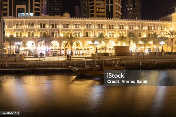 Sharjah Urban Cityscape Skyline Night Scene Al Qasba Canal In Sharjah United Arab Emirates Stock Photo - Download Image Now