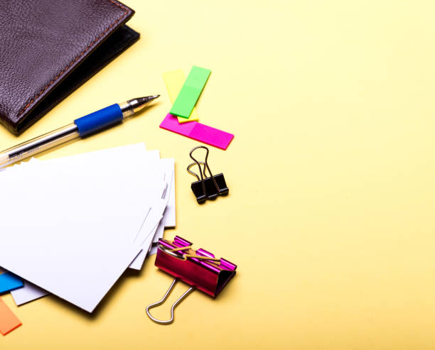istock Personal office accessories in close up. Business cards 1464567749