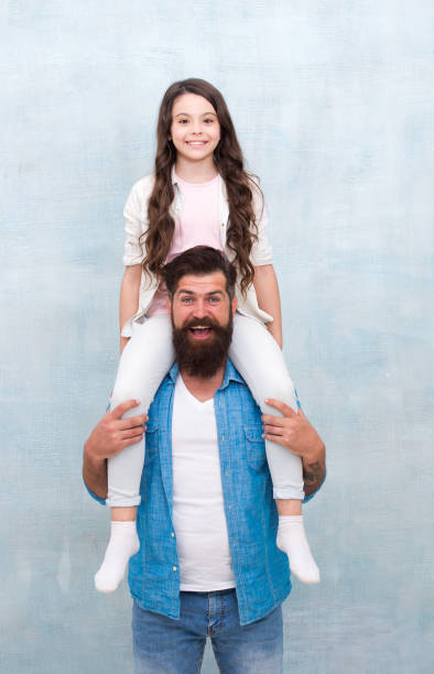 istock How dad approaches life will serve as example for daughter to build own life. Fun time together. Child and dad best friends. Happy to be father. Dad and daughter having fun. Cheerful father 1464570090