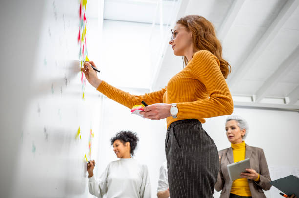 istock Business people having a meeting 1464570221