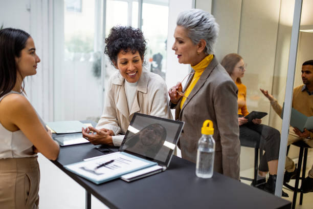 istock Business people having a meeting 1464571527