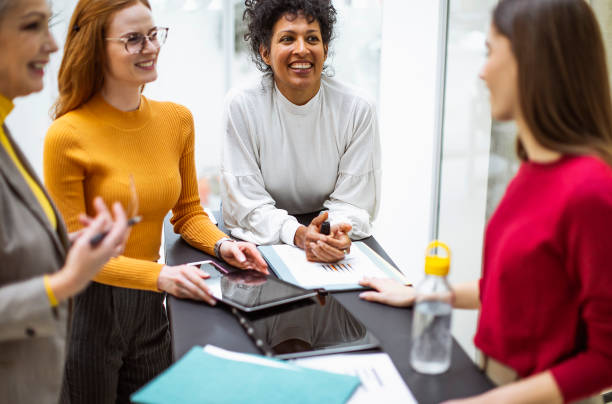 istock Business people having a meeting 1464571858