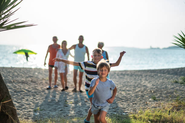 istock aA happy family of three generations on the beach 1464573312