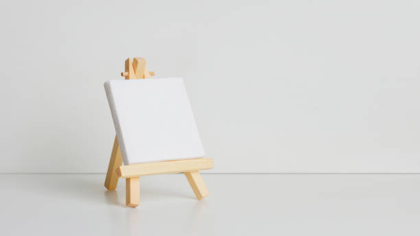 istock Mini painting on an easel on a light background. at an angle 1464579052