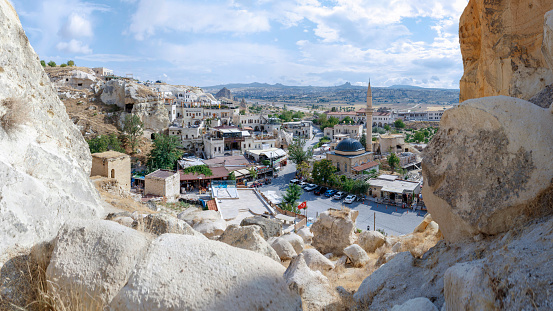 CAPPADOCIA, TURKEY, August 2021: The old troglodyte settlement of Cavusin, where you can see the oldest rock cut church in the region
