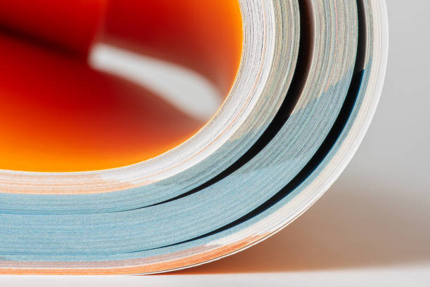 istock Pages of a rolled up book 1464585776