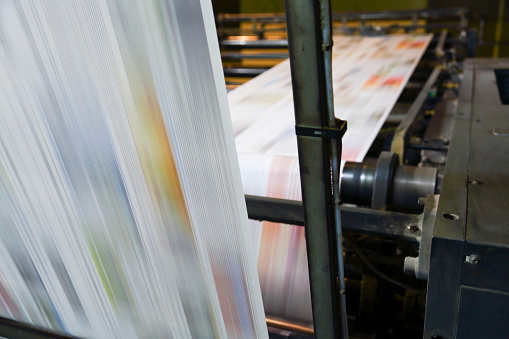 Newspaper printing press in a printing plant