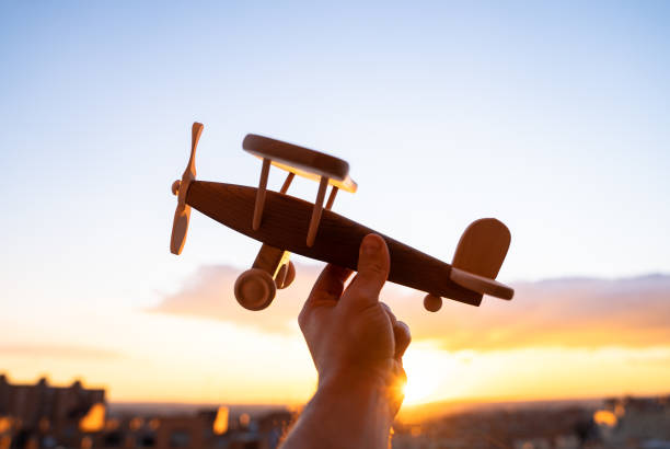 istock toy airplane concept ecological flight save the planet sunset light 1464589404