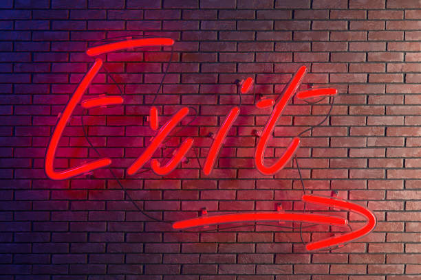 istock On a brick wall there is a glowing red neon sign with the inscription exit with an arrow towards daylight. 3d rendering. 1464590189