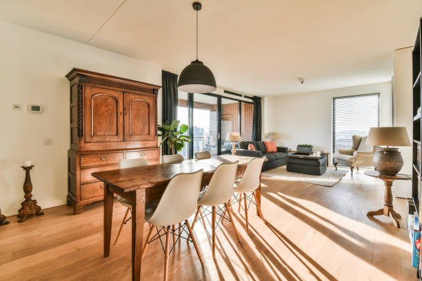 istock a living room with a dining room table and chairs 1464601110
