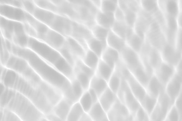 Photo of Abstract white transparent water shadow surface texture natural ripple background