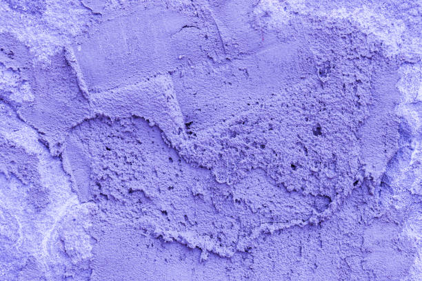 istock Fragment of old uneven blue plaster on the wall. 1464608535