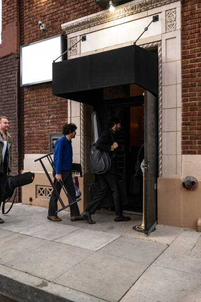 istock Band Carrying Instruments Into Venue 1464613473