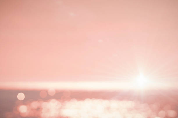 Light Pastel color sky background. Good texture pattern pink wall studio for Sweet dream cosmetic products valentines Day concept. Vintage soft white bokeh spring nature