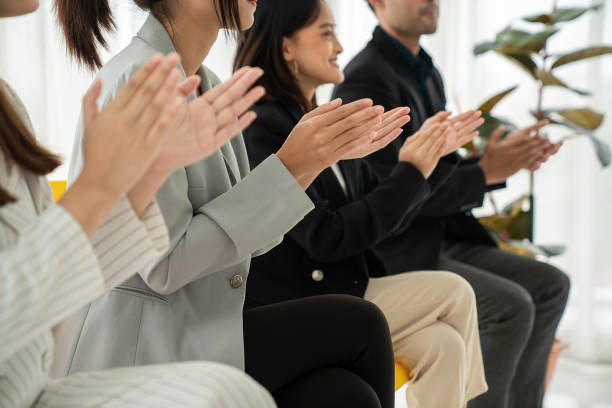 istock Businesswoman proficiently present work project receive celebrations from team . Corporate business team collaboration concept . 1464630843