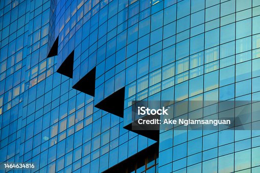istock office building The building is adorned with glass. modern against the sky 1464634816