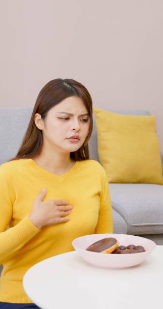 istock Asian girl digestive disease 1464636583
