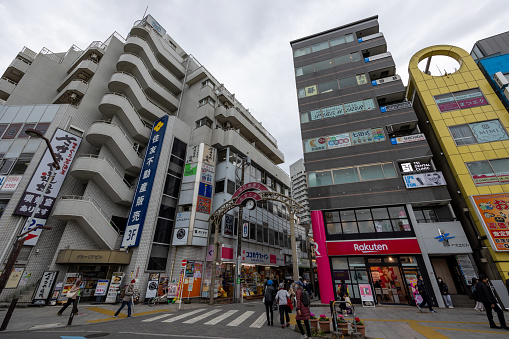 Tokyo, Japan - November 29, 2022 : People at the shopping street in Ogikubo, Suginami Ward, Tokyo, Japan. Suginami is the western part of the ward area of Tokyo.