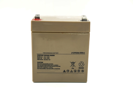 The image shows a 12V 5Ah battery inside a UPS device for backup power to electrical equipments on a white background.