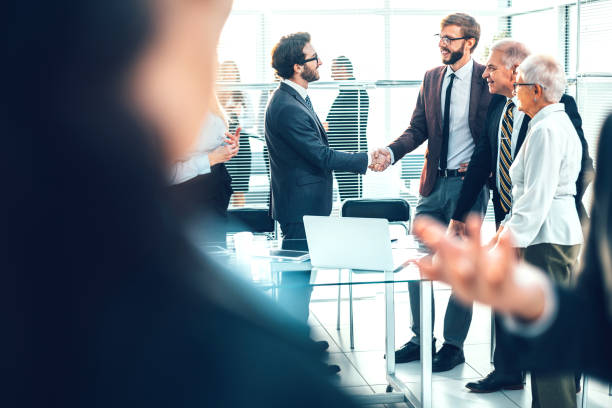 istock business people shaking hands before starting negotiations 1464665856