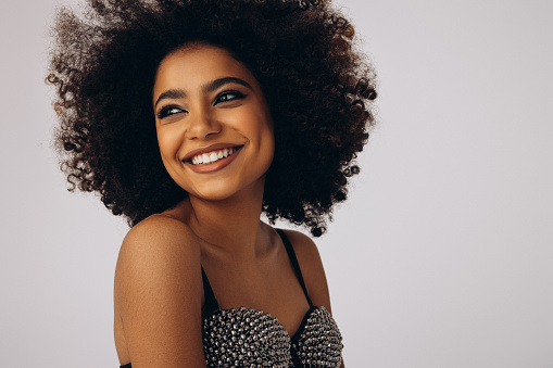 Beautiful emotional afro woman with perfect make-up