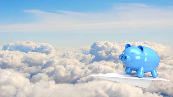 The blue piggy bank on paper plane for earn or save concept, blue piggy bank on paper plane for business concept 3d rendering