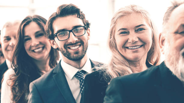 istock various business people standing in a row 1464667011